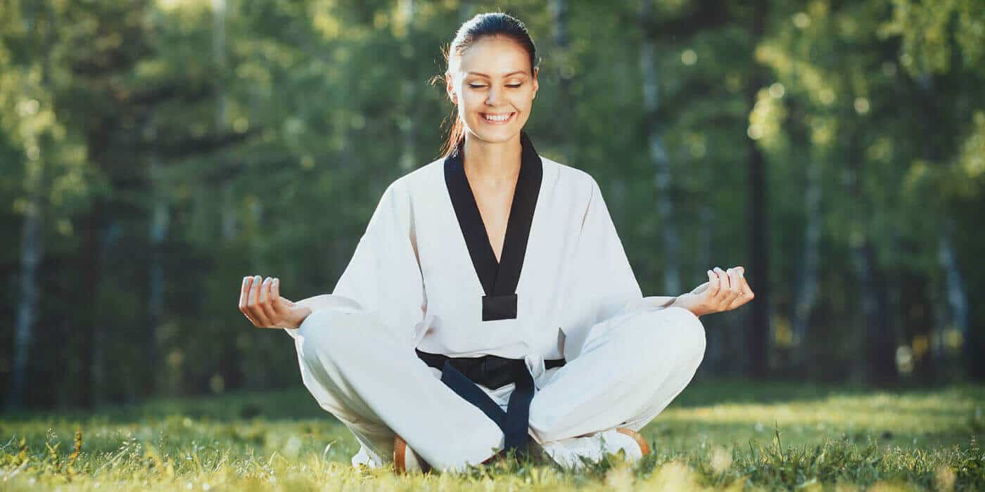 Martial Arts Lessons for Adults in Brookfield  - Happy Woman Meditated Sitting Background